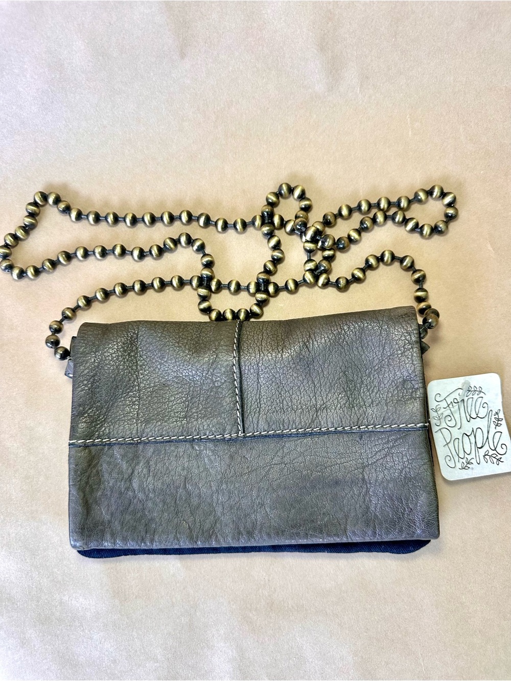 Free People leather crossbody wallet bag in gray — new with tags.